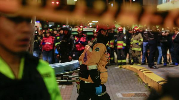 Police and emergency workers stand outside the clinic where presidential candidate Fernando Villavicencio was taken after he was shot and killed after a campaign rally in Quito, Ecuador, Wednesday, Aug. 9, 2023. - Sputnik International
