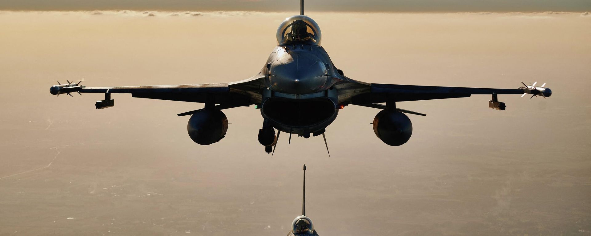 F 16 fighter jets takes part in the NATO Air Shielding exercise near the air base in Lask, central Poland on October 12, 2022. - Sputnik International, 1920, 17.08.2023