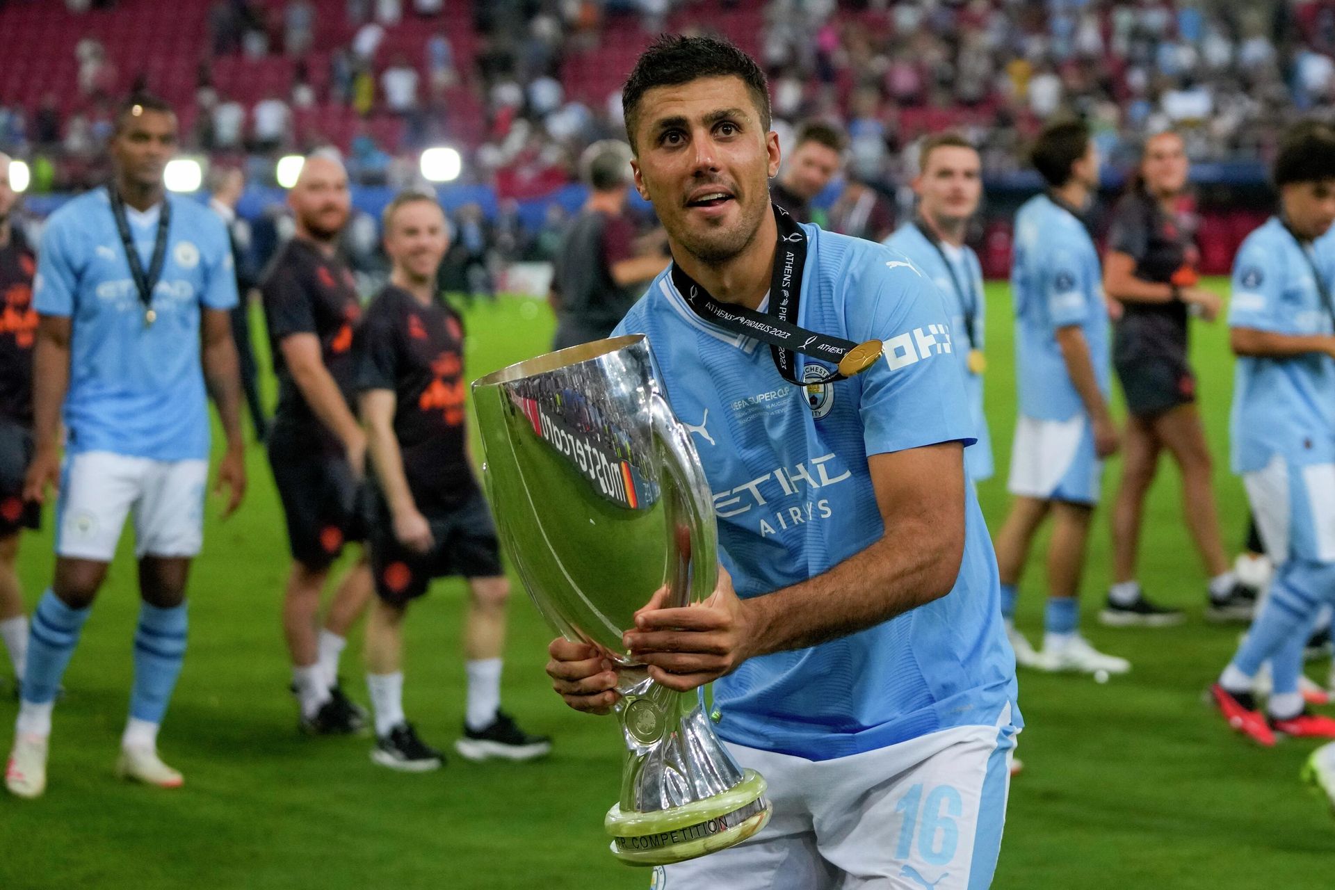 Manchester City's Rodrigo celebrates with trophy after winning the UEFA Super Cup Final soccer match between Manchester City and Sevilla at Georgios Karaiskakis stadium in Piraeus port, near Athens, Greece, Wednesday, Aug. 16, 2023. - Sputnik International, 1920, 17.08.2023