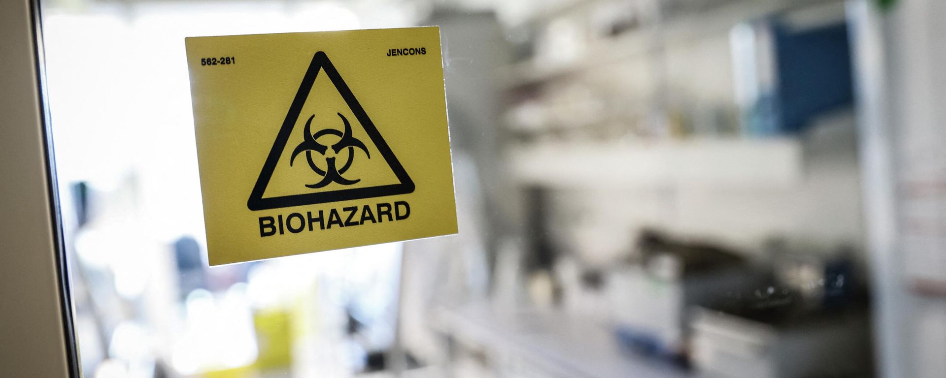 A biohazard sticker on the entrance of a laboratory. A biohazard sticker on the entrance of a laboratory. - Sputnik International, 1920, 19.08.2023