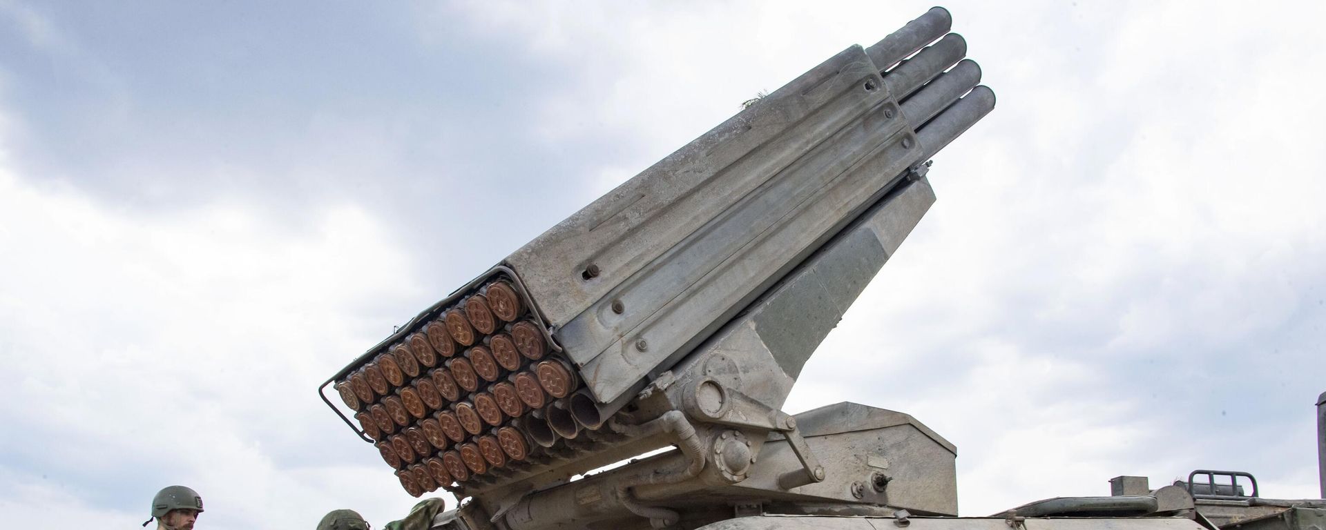  Russian servicemen are seen near the Grad multiple launch rocket system in Ukraine. File photo - Sputnik International, 1920, 06.11.2023