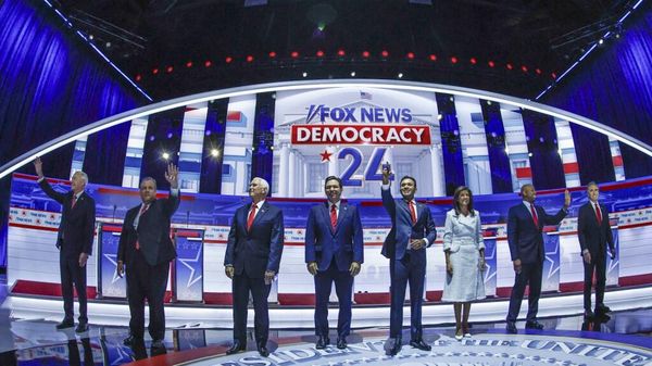 (From L) Former Governor of Arkansas Asa Hutchinson, former Governor of New Jersey Chris Christie, former US Vice President Mike Pence, Florida Governor Ron DeSantis, entrepreneur and author Vivek Ramaswamy, former Governor from South Carolina and UN ambassador Nikki Haley, US Senator from South Carolina Tim Scott and North Dakota Governor Doug Burgum arrive onstage for the first Republican Presidential primary debate at the Fiserv Forum in Milwaukee, Wisconsin, on August 23, 2023. - Sputnik International