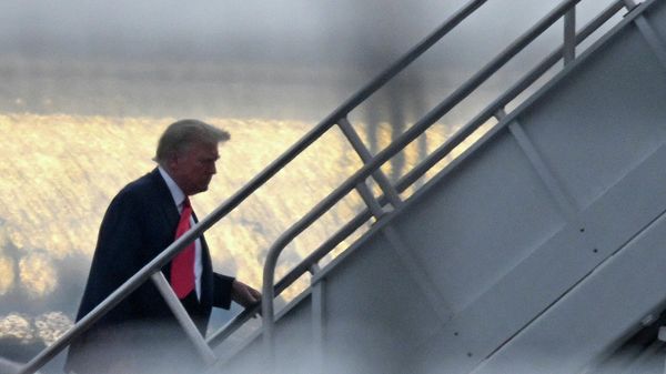 Former US President Donald Trump boards his plane as he departs Atlanta Hartsfield-Jackson International Airport in Atlanta, Georgia, on August 24, 2023. Former US President Donald Trump and 18 others have until August 25, 2023 to surrender at the courthouse after being indicted on 41 counts related to their efforts to overturn the 2020 US Presidential election.  - Sputnik International