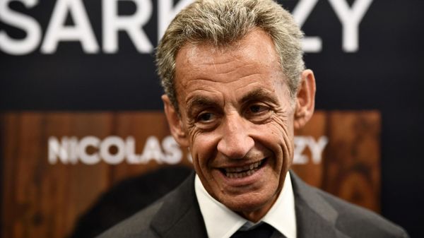 Former French President Nicolas Sarkozy reacts during a book signing session for his last book, in Arcachon, southwestern France, on August 25, 2023. Sarkozy will be tried in 2025 over allegations he took money from late Libyan dictator Moamer Kadhafi to fund one of his election campaigns, prosecutors said on August 25, 2023. - Sputnik International