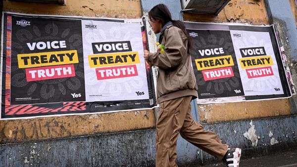 A woman walks past posters advocating for an Aboriginal voice and treaty ahead of an upcoming referendum, in Melbourne on August 30, 2023 A woman walks past posters advocating for an Aboriginal voice and treaty ahead of an upcoming referendum, in Melbourne on August 30, 2023 - Sputnik International