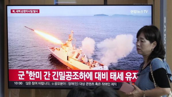 A TV screen shows a file image of North Korea's missile launch during a news program at the Seoul Railway Station in Seoul, South Korea, Saturday, Sept. 2, 2023. - Sputnik International