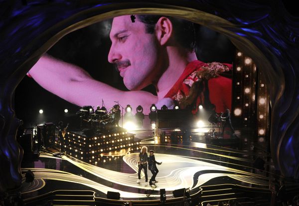The hit "Bohemian Rhapsody" remained vague, since Mercury never explained its meaning, though he always used to say that it was about relationships. Pictured in the photo above: An image of Freddie Mercury appears on-screen as Brian May (L) and Adam Lambert perform at the Oscars on February 24, 2019, at the Dolby Theatre in Los Angeles.  - Sputnik International