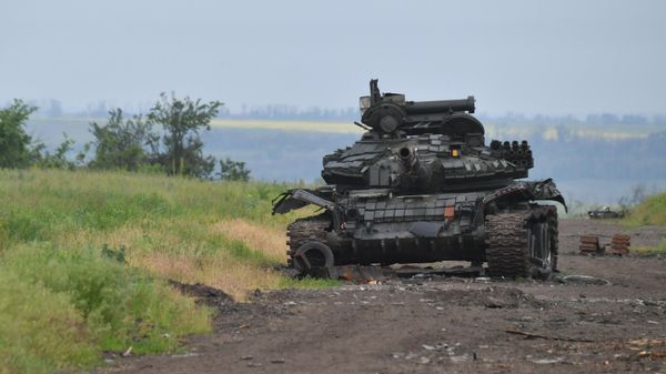 A destroyed tank of the Ukrainian armed forces in the Russian special operation zone in Ukraine. File photo - Sputnik International