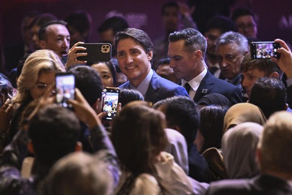People use their mobile phones to take photos of Canada's Prime Minister Justin Trudeau during the leaders talk at the ASEAN-Indo-Pacific Forum (AIPF) on the sidelines of the Association of the Southeast Asian Nations (ASEAN) Summit in Jakarta, Indonesia. - Sputnik International