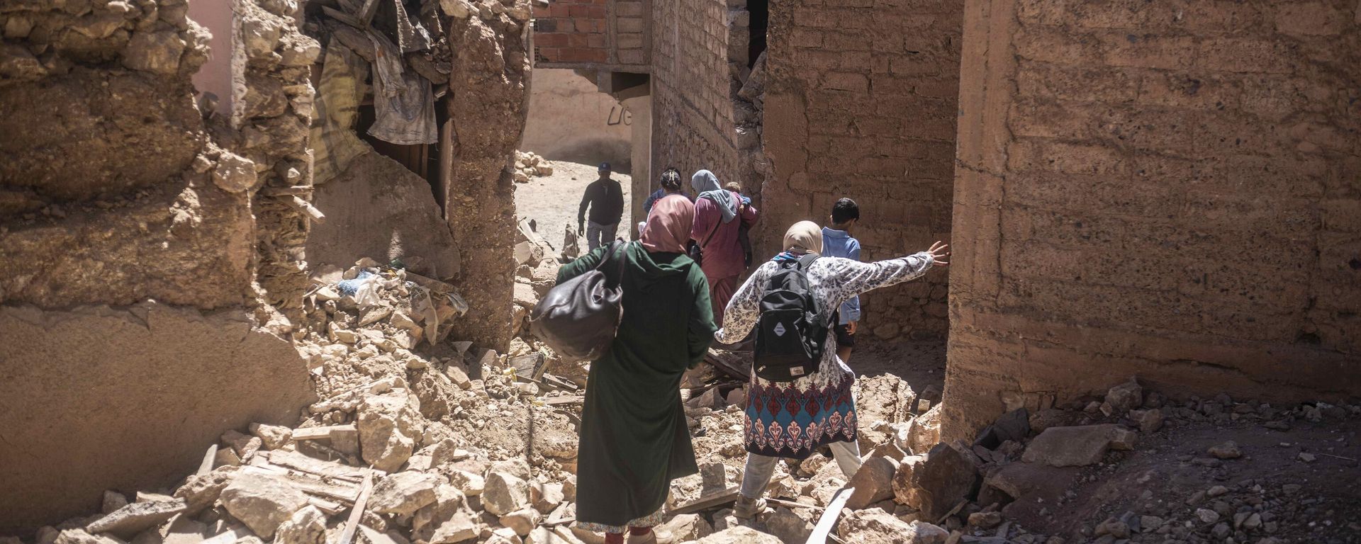 Residents flee their homes after an earthquake in Moulay Brahim village, near the epi centre of the earthquake, outside Marrakech, Morocco Residents flee their homes after an earthquake in Moulay Brahim village, near the epi centre of the earthquake, outside Marrakech, Morocco - Sputnik International, 1920, 09.09.2023