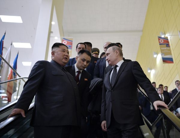 Russian President Vladimir Putin and Democratic People's Republic of Korea State Council Chairman Kim Jong-un after talks at the Far Eastern Federal University campus in Vladivostok. - Sputnik International