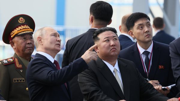 Russian President Vladimir Putin meets North Korean leader Kim Jong Un at the Vostochny Cosmodrome on September 13, 2023. - Sputnik International