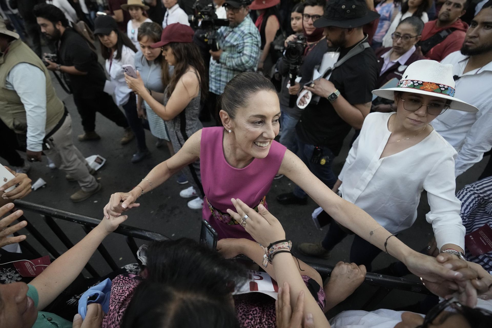Mexico City Mayor Claudia Sheinbaum, right, greets supporters as she leaves a rally at the Revolution Monument in Mexico City, Thursday, June 15, 2023. Sheinbaum announced that she is resigning her post as Mexico City Mayor to enter the primary race for the country's 2024 presidential election. - Sputnik International, 1920, 22.09.2023