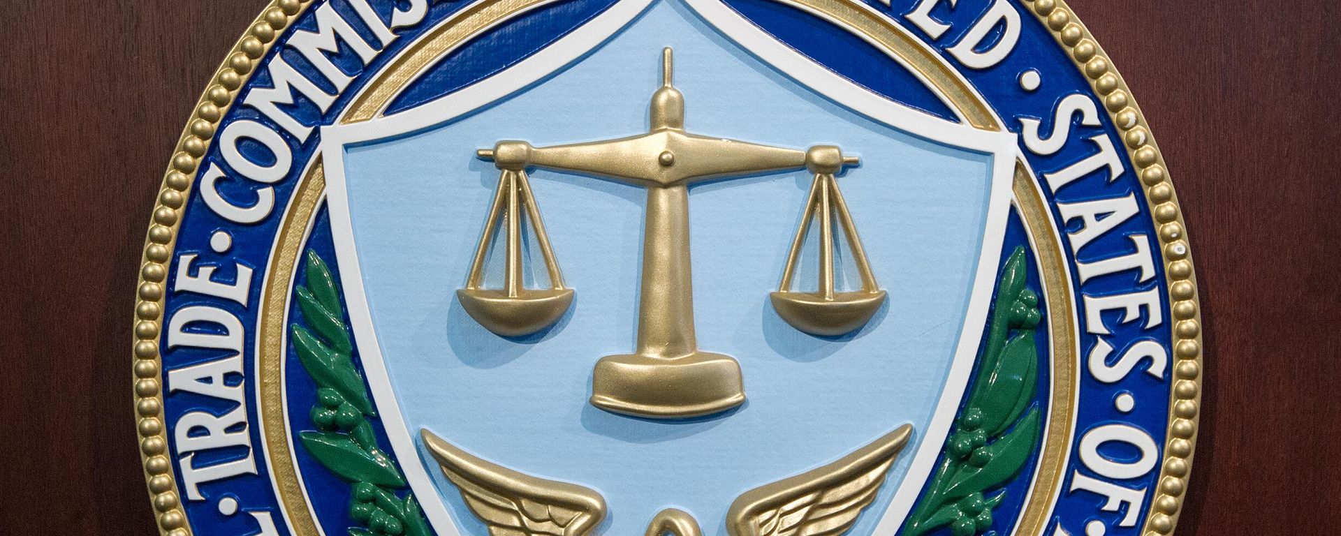 The seal of the Federal Trade Commission(FTC) is seen on the lecturn in the Commissioner's Conference Room January 15, 2014 inside the FTC headquarters in Washington, DC. AFP Photo/Paul J. Richards (Photo by Paul J. RICHARDS / AFP) The seal of the Federal Trade Commission(FTC) is seen on the lecturn in the Commissioner's Conference Room January 15, 2014 inside the FTC headquarters in Washington, DC. AFP Photo/Paul J. Richards (Photo by Paul J. RICHARDS / AFP) - Sputnik International, 1920, 27.09.2023