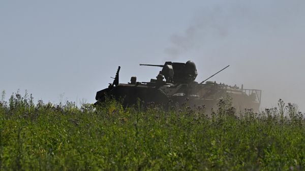 Ukrainian servicemen ride an YPR 765 infantry fighting vehicle on June 20, 2023 - Sputnik International
