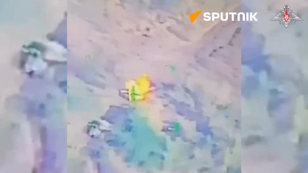 Russian troops turned two Ukrainian tanks and several armored vehicles into a pile of scrap metal - Sputnik International