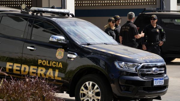Federal Police agents stand at Federal Police headquarters minutes before the arrival of Brazil's former President Jair Bolsonaro who will testify in Brasilia, Brazil, Thursday, Aug. 31, 2023. Bolsonaro and seven others were summoned to answer questions about the sale of luxury goods reportedly worth millions, that the former leader received as gifts from Saudi Arabia while in office, according to a Brasilia federal police officer who spoke on condition of anonymity to discuss the ongoing investigation.  - Sputnik International