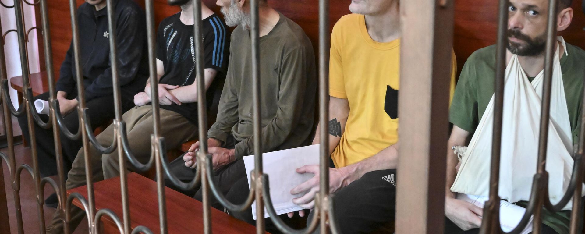 Foreign mercenaries are seen being brought to court in Donetsk. File photo - Sputnik International, 1920, 13.03.2025