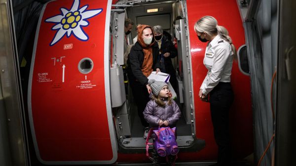 Ukrainian refugees exit a plane chartered by a Swiss millionaire at Zurich Airport, on March 22, 2022.  - Sputnik International
