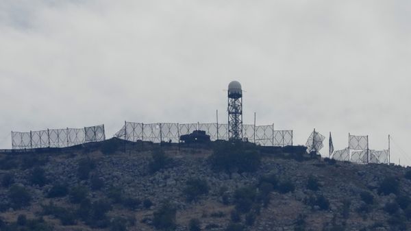 The fence of an Israeli military position is seen damaged after Hezbollah targeted it by rockets, on an occupied hill of Kfar Chouba village, southeast Lebanon - Sputnik International