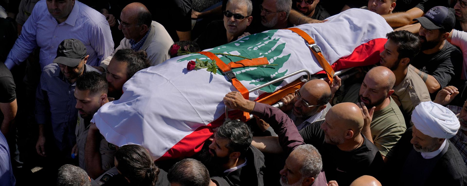 Mourners carry the body of Reuters videographer Issam Abdallah who was killed by Israeli shelling during his funeral procession in his hometown of Khiam, southern Lebanon, Saturday, Oct. 14, 2023 Mourners carry the body of Reuters videographer Issam Abdallah who was killed by Israeli shelling during his funeral procession in his hometown of Khiam, southern Lebanon, Saturday, Oct. 14, 2023 - Sputnik International, 1920, 03.11.2023
