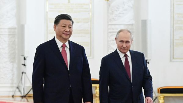 Russian President Vladimir Putin's meeting with Chinese counterpart Xi Jinping in Moscow. File photo - Sputnik International