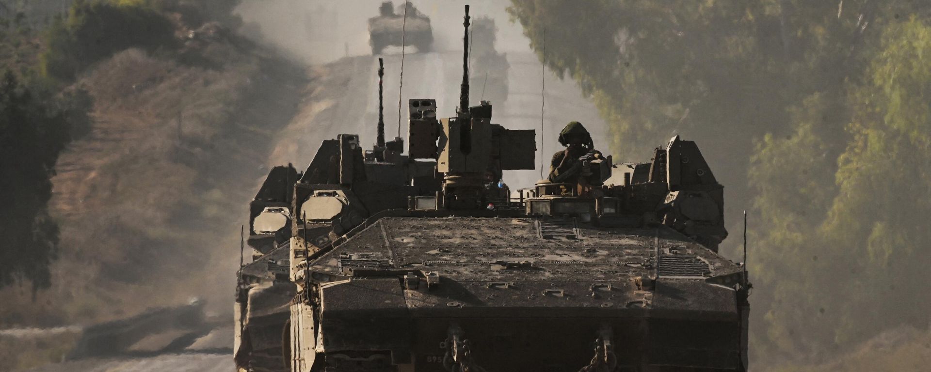 Israeli army armoured vehicles roll towards the border with the Gaza Strip at an undisclosed location in southern Israel on October 15, 2023. Israeli army armoured vehicles roll towards the border with the Gaza Strip at an undisclosed location in southern Israel on October 15, 2023. - Sputnik International, 1920, 15.10.2023