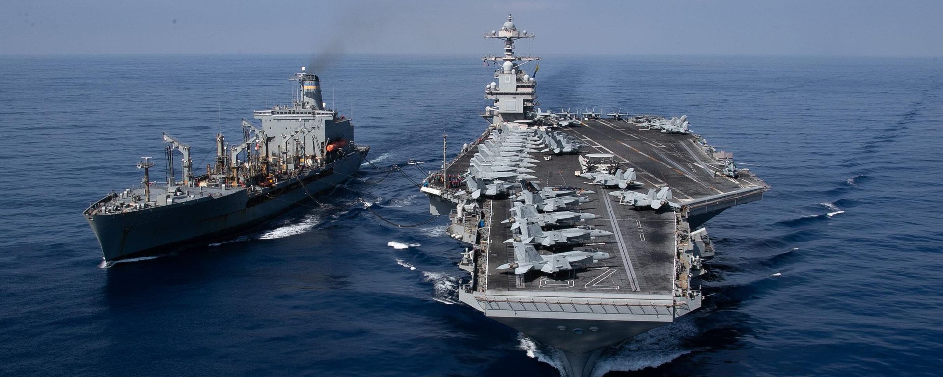The world's largest aircraft carrier USS Gerald R. Ford (CVN) 78 and the USNS Laramie (T-AO-203) conduct a refueling-at-sea in the Eastern Mediterranean Sea, Oct. 11, 2023. The world's largest aircraft carrier USS Gerald R. Ford (CVN) 78 and the USNS Laramie (T-AO-203) conduct a refueling-at-sea in the Eastern Mediterranean Sea, Oct. 11, 2023. - Sputnik International, 1920, 16.10.2023