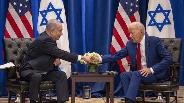 US President Joe Biden shakes hands with Israeli Prime Minister Benjamin Netanyahu as they meet on the sidelines of the 78th United Nations General Assembly in New York City on September 20, 2023.  - Sputnik International