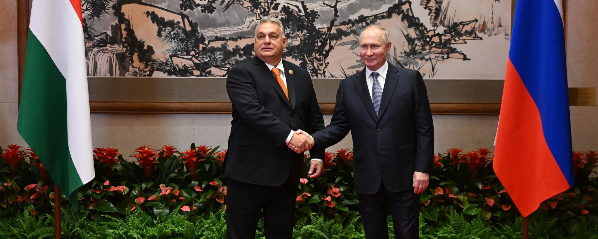 Hungarian Prime Minister Viktor Orban and Russian President Vladimir Putin shake hands before their meeting as part of the 3rd Belt and Road Forum at the Diaoyutai State Guest House in Beijing, China - Sputnik International, 1920, 08.07.2024