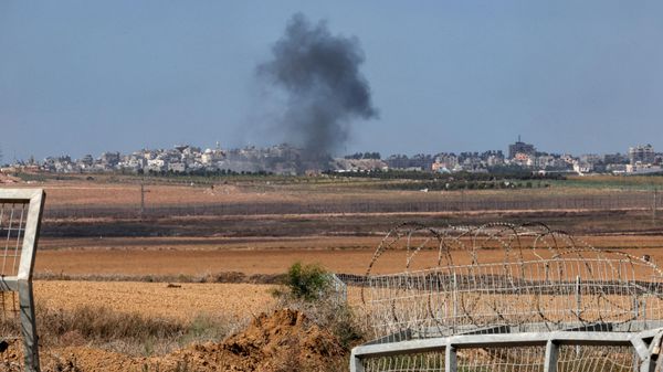 This picture taken on October 18, 2023 from kibbutz Kfar Aza in southern Israel shows smoke billowing across the border during bombardment in the Gaza Strip. - Sputnik International