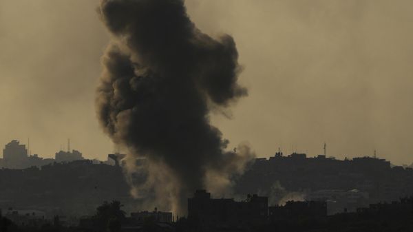 Smoke rises following an Israeli airstrike in the Gaza Strip, as seen from southern Israel, Wednesday, Oct. 18, 2023.  - Sputnik International