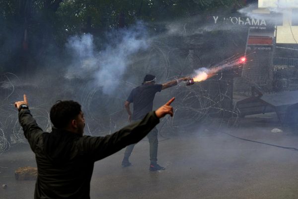 A protester launches fireworks at riot police during a demonstration, in solidarity with the Palestinian people in Gaza, near the US Embassy in Aukar, a northern suburb of Beirut, Lebanon. - Sputnik International