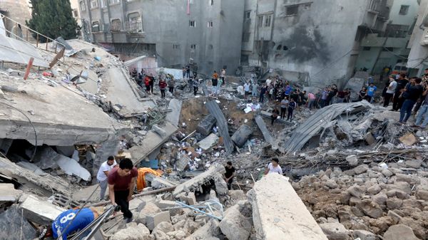 Palestinians search the destroyed annex of the Greek Orthodox Saint Porphyrius Church, the oldest church still in use in Gaza, damaged in a strike on Gaza City on October 20, 2023, amid the ongoing battles between Israel and the Palestinian group Hamas. - Sputnik International