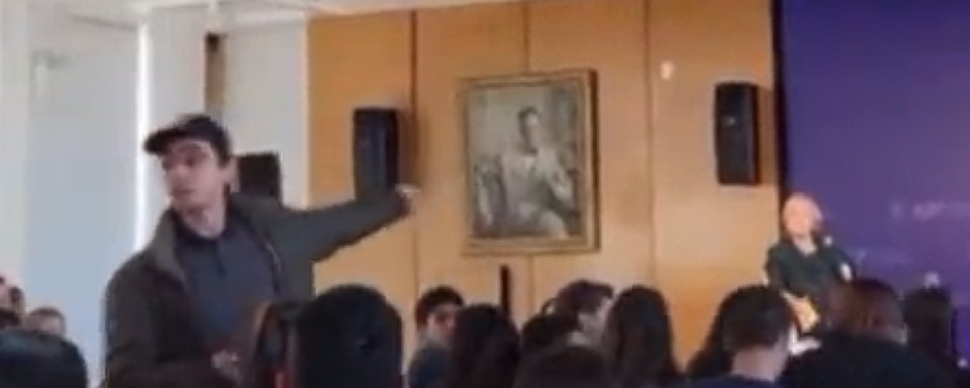 A protester heckles former US Secretary of State Hillary Clinton during an event at Columbia University’s Institute of Global Politics on Monday - Sputnik International, 1920, 24.10.2023