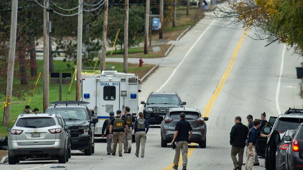 FBI agents are on the scene at Schemengees Bar where a mass shooting occurred yesterday in Lewiston, Maine on October 26, 2023. A massive manhunt was under way on October 26 for a gunman who a local official said killed at least 22 people and wounded dozens more in mass shootings in the US state of Maine, the deadliest such incident this year. - Sputnik International