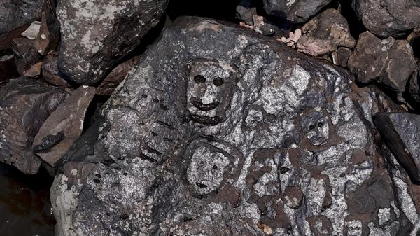 Ancient rock carvings that reappeared in the region of the Lajes Archaeological Site due to the severe drought affecting the region's rivers are pictured on the banks of the Negro River in Manaus, Amazonas State, northern Brazil. - Sputnik International