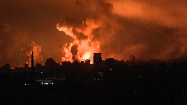 This image grab from an AFP TV footage shows balls of fire and smoke rising above Gaza City during an Israeli strike on October 27, 2023, as battles between Israel and the Palestinian Hamas movement continue - Sputnik International
