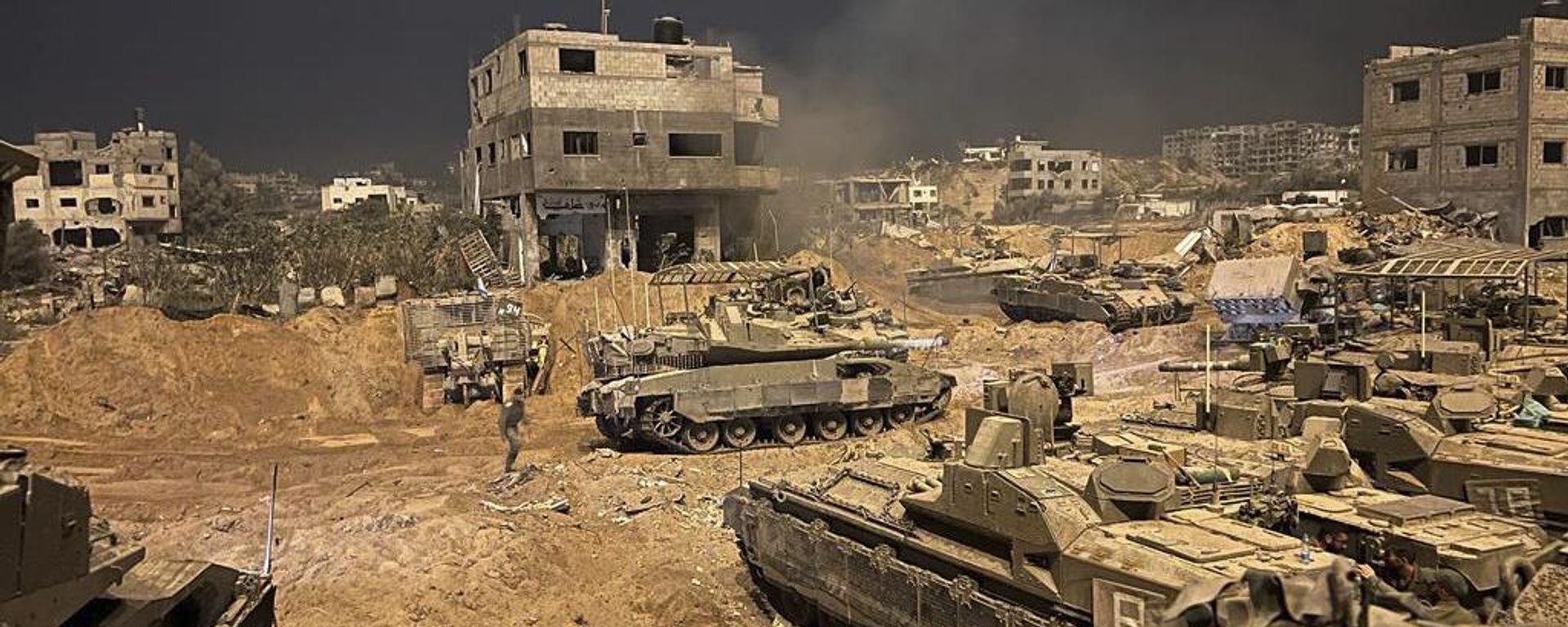 In this undated photo provided by the Israeli military, Israeli armored personnel carriers are seen during a ground operation in the Gaza Strip. Israeli ground forces have been operating in Gaza in recent days as Israel presses ahead with its war against Hamas militants In this undated photo provided by the Israeli military, Israeli armored personnel carriers are seen during a ground operation in the Gaza Strip. Israeli ground forces have been operating in Gaza in recent days as Israel presses ahead with its war against Hamas militants - Sputnik International, 1920, 05.11.2023