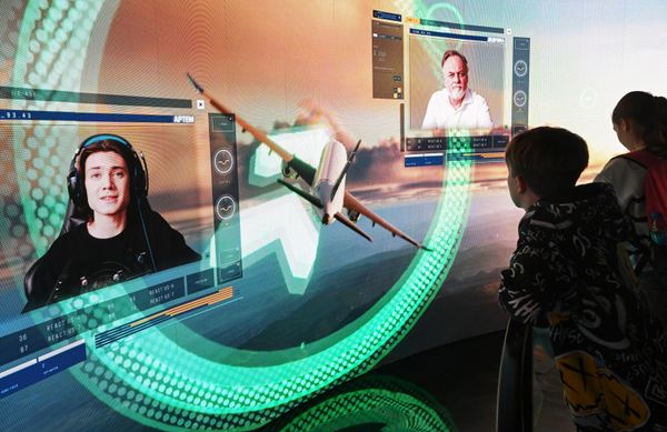 The exhibition gathers the country's main achievements into one venue.Above: Visitors at Russia Expo. - Sputnik International