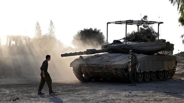 Israeli tanks and bulldozers are deployed along the Israel-Gaza border, amid the ongoing battles between Israel and the Palestinian group Hamas on November 4, 2023. - Sputnik International