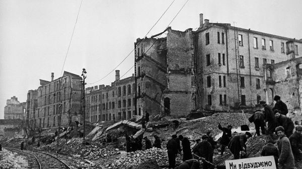 Great Patriotic War 1941-1945. Liberation of Kiev from the Nazi invaders. We are rebuilding you, our dear Kiev! - workers wrote on the poster. November 1944. Great Patriotic War 1941-1945. Liberation of Kiev from the Nazi invaders. We are rebuilding you, our dear Kiev! - workers wrote on the poster. November 1944. - Sputnik International