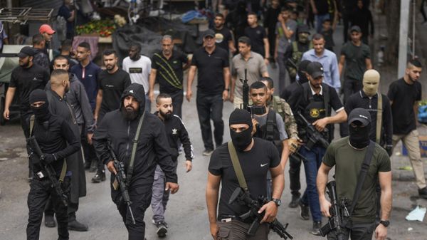 Palestinian militants attend the funeral of Aysar al-Amer, 25, a local commander in the Islamic Jihad militant group, and Jawad Turki, 19, in the West Bank city of Jenin, Friday, Oct. 27, 2023.  - Sputnik International