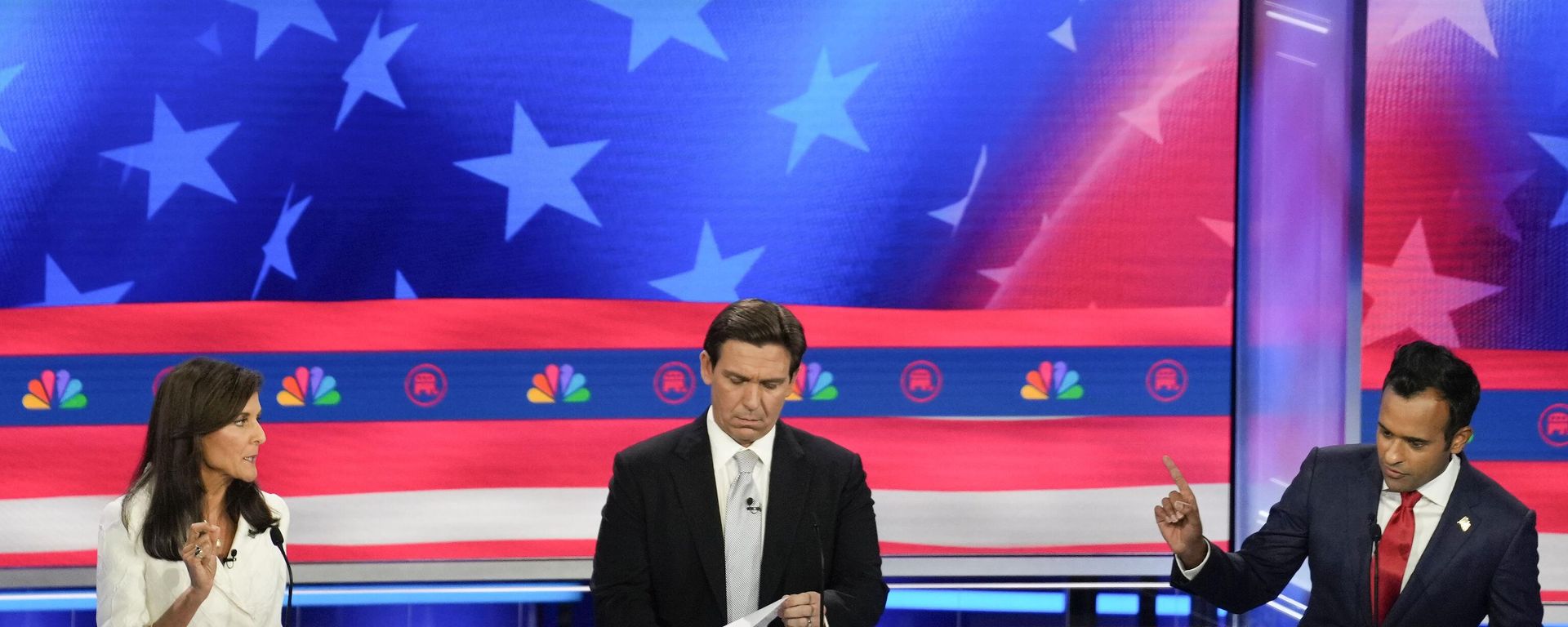 Republican presidential candidates from left, former UN Ambassador Nikki Haley, Florida Gov. Ron DeSantis, and businessman Vivek Ramaswamy, participate in a Republican presidential primary debate hosted by NBC News Wednesday, Nov. 8, 2023, at the Adrienne Arsht Center for the Performing Arts of Miami-Dade County in Miami. Republican presidential candidates from left, former UN Ambassador Nikki Haley, Florida Gov. Ron DeSantis, and businessman Vivek Ramaswamy, participate in a Republican presidential primary debate hosted by NBC News Wednesday, Nov. 8, 2023, at the Adrienne Arsht Center for the Performing Arts of Miami-Dade County in Miami. - Sputnik International, 1920, 09.12.2023