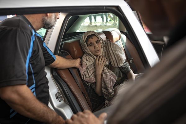 A Palestinian injured in Israel's bombardment of the Gaza Strip is taken to a hospital in Khan Younis. - Sputnik International