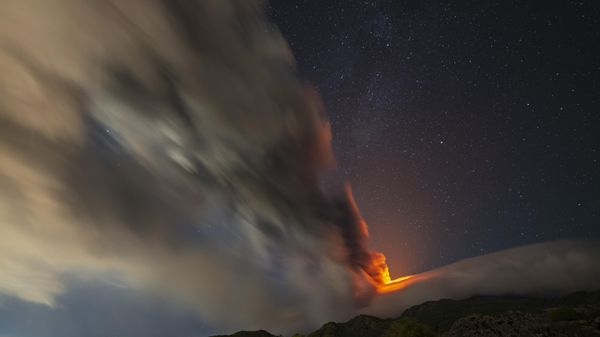 Smoke billows from Europe's tallest volcano, Mt. Etna, as seen from an area near the village of Sant'Alfio, north of Catania, Sicily, southern Italy, Sunday, Nov. 12, 2023.  - Sputnik International