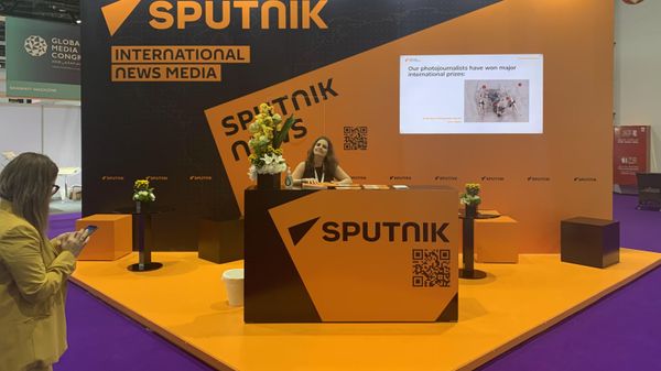 A view shows a stall of Rossiya Segodnya International Information Agency under the brand Sputnik during the Global Media Congress in Abu Dhabi, United Arab Emirates - Sputnik International