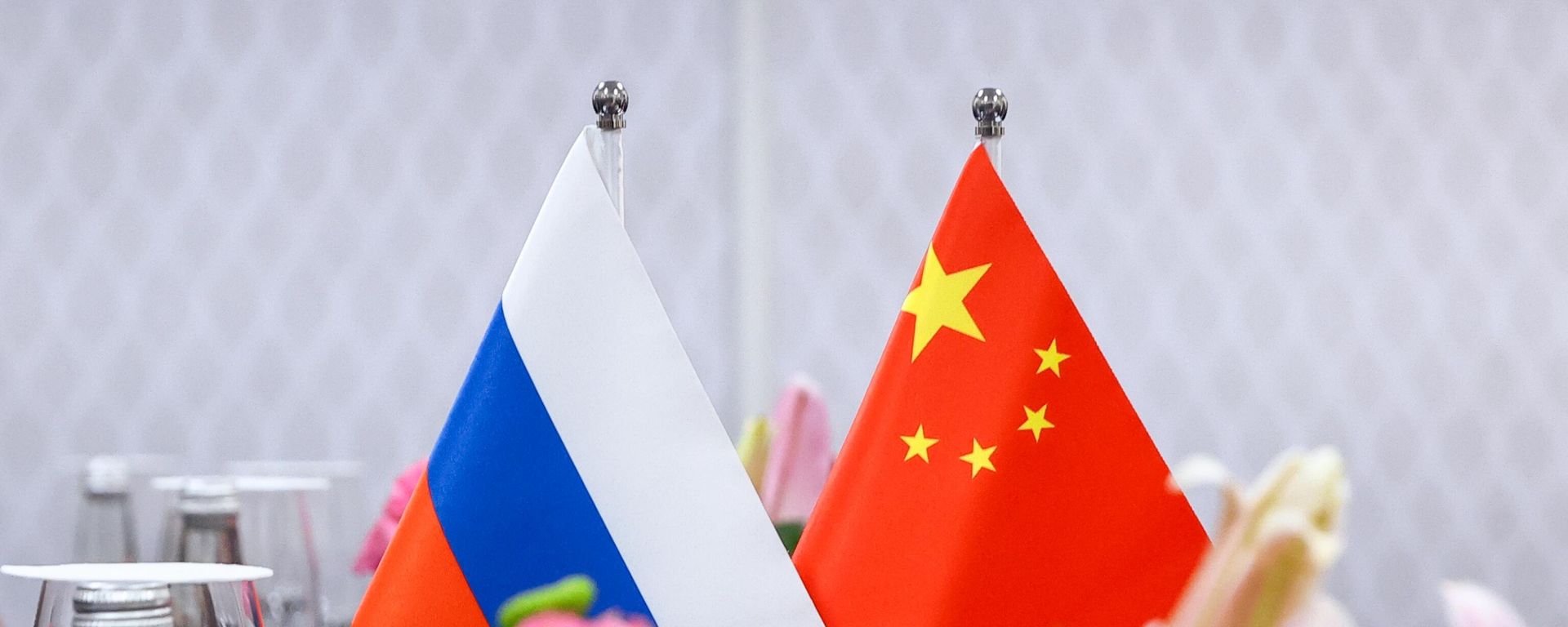 Russian and Chinese flags. File photo Russian and Chinese flags. File photo - Sputnik International, 1920, 31.01.2024