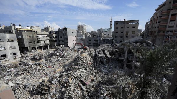 Palestinians search for the bodies of the al Meghari family killed in the Israeli bombardment of the Gaza Strip in Bureij refugee camp, Gaza Strip, Tuesday, Nov. 14, 2023.  - Sputnik International