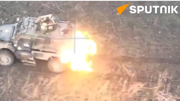 Russian Drones Destroy Ukrainian Military Equipment  - Sputnik International